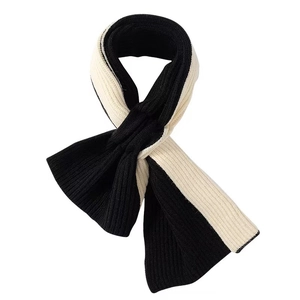 Classic black and white knit scarf with premium ribbed texture for winter warmth