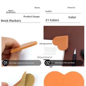 Detail view of heart-shaped lychee grain leather bookmark with fine stitching in vibrant orange