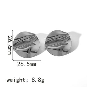 Detailed view of silver wavy steel stud earrings with 26.5mm diameter and 8.8g weight