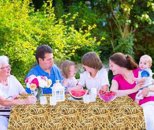 Detailed straw pattern on a disposable PE tablecloth for farm and western cowboy parties