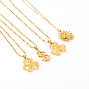 Gold 18K titanium steel necklaces featuring clover, dollar sign, and sun pendants