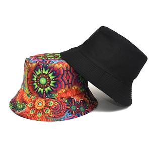 Fashionable reversible fisherman bucket hat in black and colorful bohemian mandala print