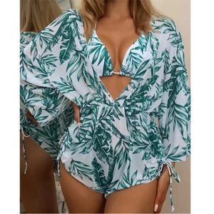 Three-piece tropical leaf print bikini set with long sleeve mesh cover-up showing back view