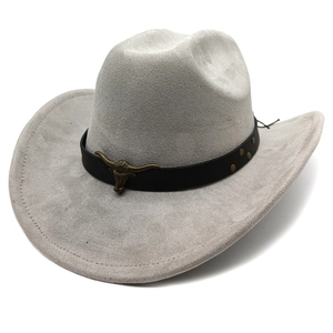 Close-up of a faux suede cowboy hat with a metal bull head buckle and leather belt detail