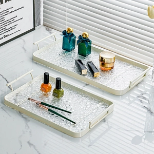 Rectangular decorative serving tray with cream handles and hammer-textured transparent base