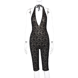 Detail of delicate black lace halter bodysuit with deep V-neck and sheer lining fabric