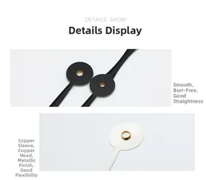 Detailed macro view of black aluminum clock hands featuring reinforced copper core bushing