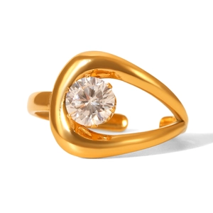 Detail of adjustable gold ring with round cubic zirconia in a modern drop-shaped setting