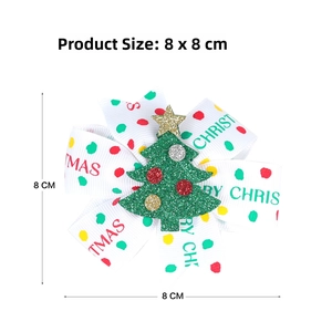 Detail of 8x8 cm Merry Christmas bow hair clip with a green glitter tree and polka dots