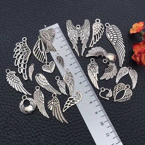 Antique silver feather wings and heart charms jewelry making set with size scale