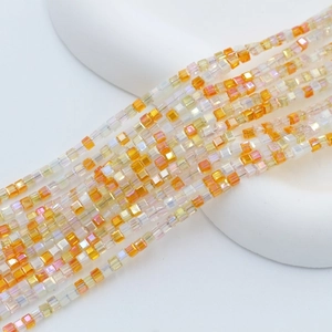 Macro view of multi-color 2mm faceted crystal glass cube beads for DIY jewelry making