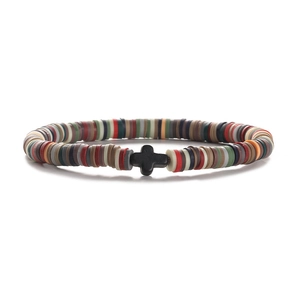 Detailed macro view of 6mm colorful clay beads bracelet with a black cross charm