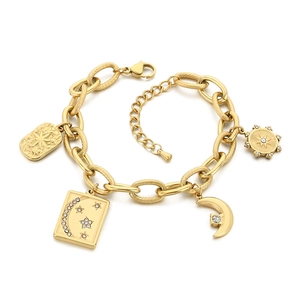 Elegant 18K gold-plated star and moon charm bracelet with sparkling cubic zirconia crystals