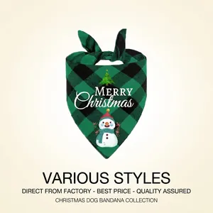 Close-up of Christmas pet bandana with green plaid pattern and snowman illustration