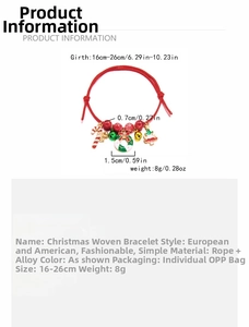 Detail of red woven Christmas bracelet featuring charms like Santa, bells, and candy cane