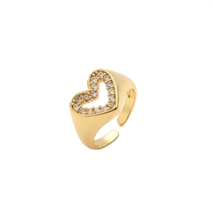 Minimalist gold heart ring featuring sparkling zircon pavé setting on a white background