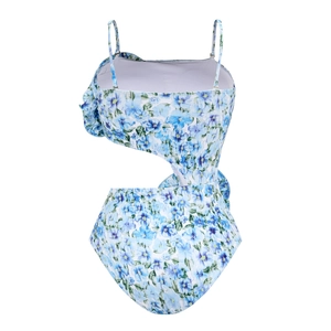 Detail of blue floral swimsuit with ruffle shoulder and stylish waist cut-out design