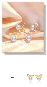 Detail of bowknot pearl earrings with sparkling zircon inlay and anti-tarnish metal finish