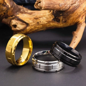 Fashionable titanium steel rings for men in gold, silver and black with grooved design