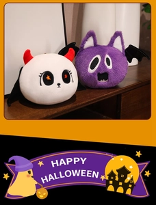 Detailed view of Halloween plush toys featuring white ghost and purple bat characters