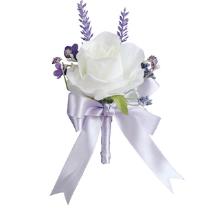 Wedding boutonniere with white artificial rose, purple lavender, and satin bow
