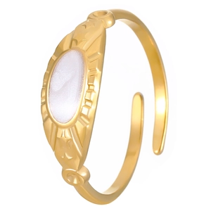 Detail of 18K gold plated steel ring with white enamel oval and sunburst star engraving