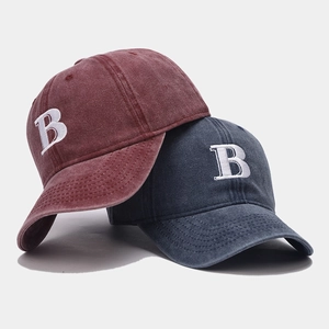 Vintage washed cotton baseball caps in burgundy and navy blue with white letter B embroidery