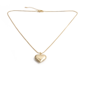 Detailed view of gold heart pendant necklace with delicate chain and lobster clasp