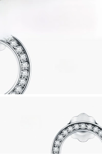 Detailed close-up of s925 silver round earrings with hand-set 5A cubic zirconia stones