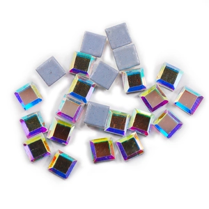 Macro shot of K9 AB rainbow crystal rhinestones showing sparkling facets and grey flat backs