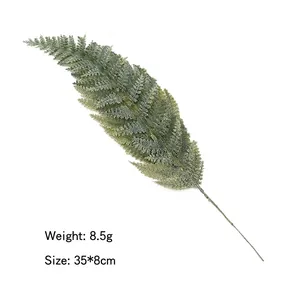 Artificial fern pine leaf detail with weight 8.5g and size 35x8cm on white background
