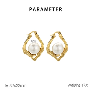 Detail showing irregular gold textured earrings with shell pearl and size dimensions