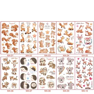 Detailed grid showing ten cute animal cartoon temporary tattoo stickers for children