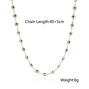 Gold-plated necklace with blue evil eye pendants, 40+5cm length shown on white backdrop