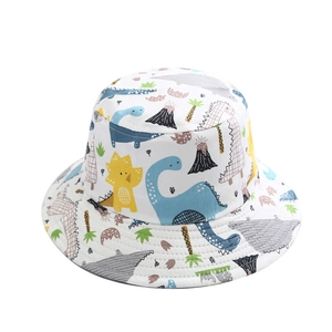 White children's bucket hat with colorful cartoon dinosaur and volcano pattern prints