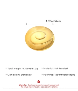 Détail de la broche spirale en acier doré de 4cm avec dimensions et poids indiqués