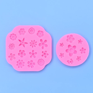 Pink floral silicone mold set for chocolate fondant and cake decorating with various flower shapes