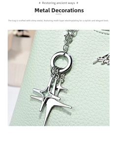 Detailed macro shot of mint green litchi grain leather and shiny silver hardware star