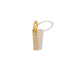 Detailed view of a gold-plated PVD stainless steel vertical bar pendant with cubic zirconia