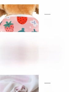 Detailed view of pink cotton dog vest with strawberry print and breathable mesh fabric