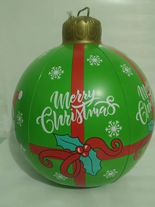 Detail of green PVC inflatable Christmas ball with Merry Christmas text and LED light