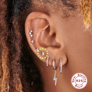 Detail of S925 sterling silver stud with rectangle zircon on cartilage piercing
