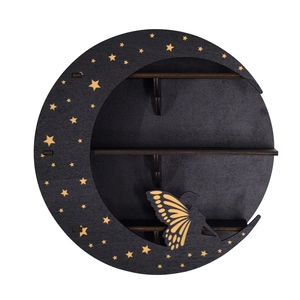 Detail of black moon-shaped wooden shelf featuring star cutouts and a butterfly fairy