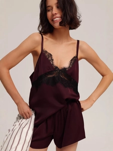 Sexy burgundy satin pajama set for women with black lace trim and halter neck design