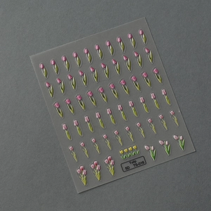 Détail des stickers 5D en relief pour ongles avec motifs de tulipes roses texturées