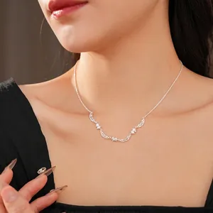 Elegant silver bow pendant necklace with sparkling zircon for women in a luxury fashion style