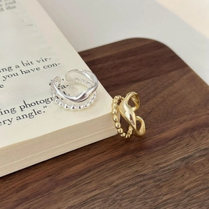 Minimalist S925 sterling silver stacked rings with wavy and beaded textures in gold and silver