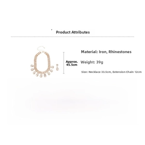 Detail view of rhinestone water drop tassel necklace and earring set in golden finish