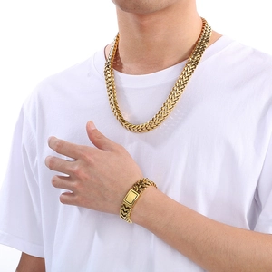 Gold stainless steel heart necklace and bracelet set with chunky woven link chain design