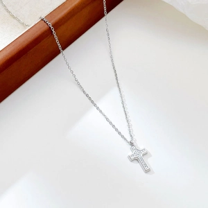 Elegant stainless steel cross pendant necklace with sparkling zircon stones for women